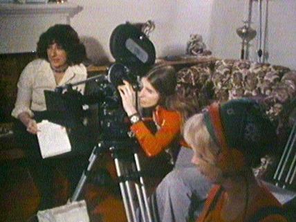 3 women on the set of "I'll Fly Away."